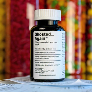 Detailed close-up of the 'Ghosted... Again' parody prescription bottle label by Take Two & Text Me, listing comical symptoms and treatment protocols.