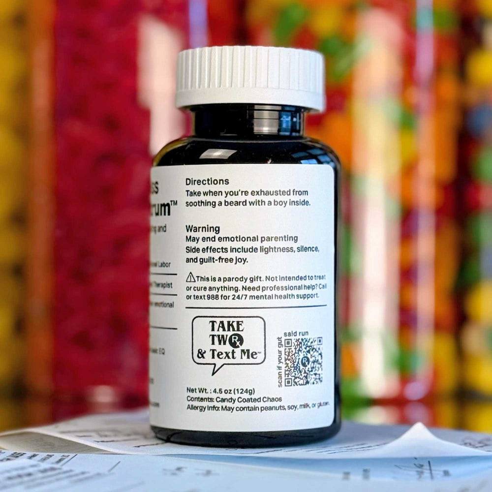 A dark amber parody prescription bottle labeled 'Grown-Ass Man Tantrum' by Take Two & Text Me, a locally designed Charleston, SC gag gift for relationship humor.